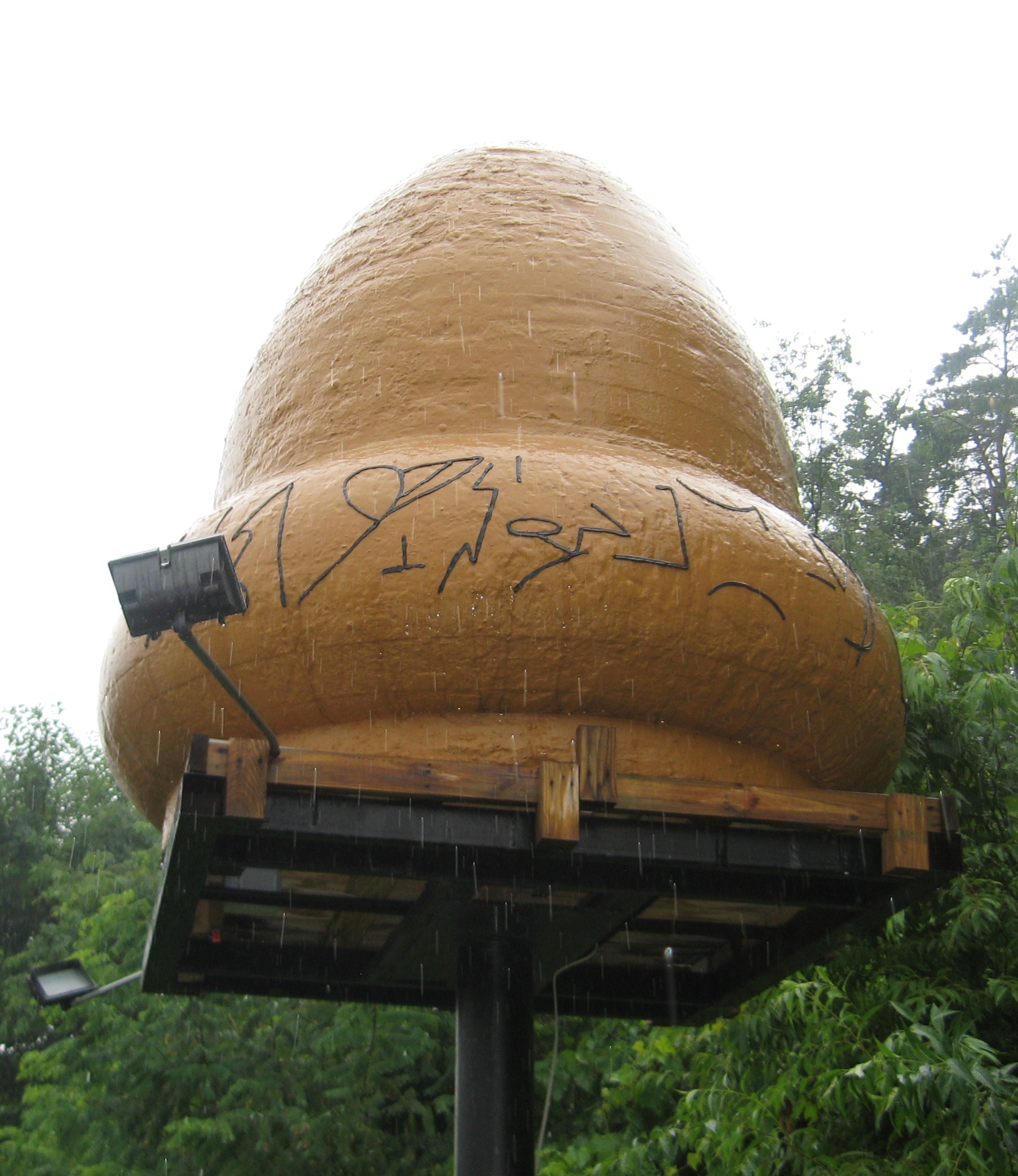 The 'acorn' replica at Kecksburg, Pennsylvania — a fiberglass model installed by the village to commemorate the 9 December 1965 incident, when residents reported a bell-shaped object crashing in the woods east of town. The Air Force never released a recovery report.